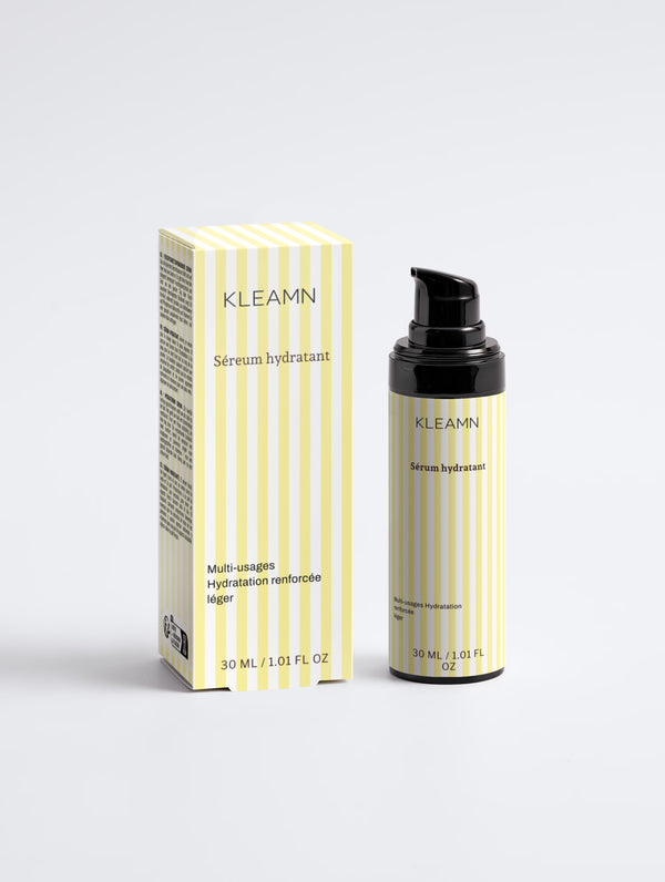 Sérum qui coule d'une pipette avec gouttes d'eau, fond olive — collection Peau sèche & déshydratée